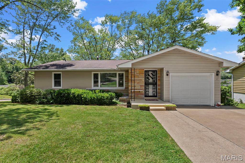 Step into this meticulously maintained residence, built in 1959, where timeless character meets modern comfort. This home offers a rare opportunity for buyers seeking established charm paired with thoughtful upgrades. 
You’ll be captivated by the completely renovated kitchen, featuring custom cabinetry and sleek stainless-steel appliances, perfect for both everyday living and entertaining. The refinished original hardwood floors add warmth and elegance, seamlessly blending history with style. 
Outside, enjoy the spacious fenced-in backyard, ideal for gatherings, pets, or simply relaxing, all situated on a desirable corner lot that enhances both curb appeal and convenience.
Don’t miss your chance to own this exceptional property... schedule your private viewing today and discover the perfect balance of classic design and contemporary living.