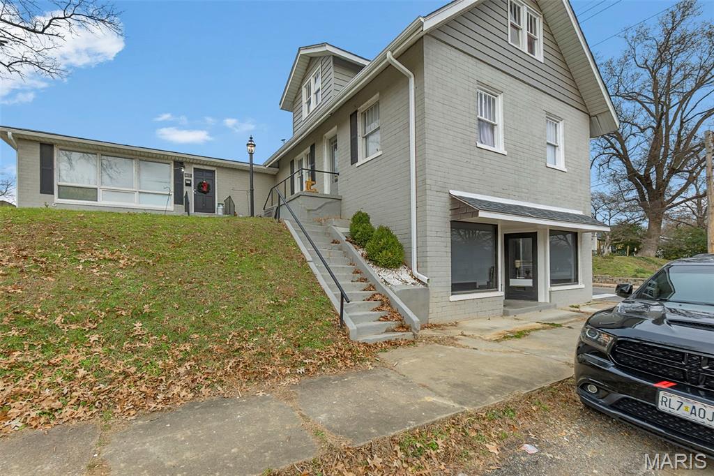 Great investment opportunity with this versatile mixed-use property offering three income-producing units in a convenient location.
Unit A (middle) is currently leased as a residential unit on a month to month term. Unit B (top) operates as an Airbnb rental, offering short-term income potential and flexibility. Unit C (bottom) is a commercial space currently leased at $1,000/month through 9/15/2026, adding immediate cash flow. With multiple income streams already in place and an assumable loan option available, this property is ideal for investors looking to expand their portfolio or owner-occupants seeking supplemental income.