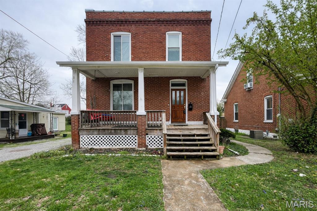 This Belleville home is a great rental property, investment opportunity, or perfect for a first-time home buyer. Welcome to this charming and nicely 3-bedroom, 2-bath brick bungalow perfect for first time home buyers, located close to shopping & public transportation. This home offers the ideal blend of convenience, character, and functionality. Numerous updates throughout the home provide peace of mind while maintaining its classic charm. A covered front porch offers a graceful welcome, while the fenced backyard creates a private retreat for entertaining or relaxing. Detached 1-car garage. This home still has a lot of the late 1800 look and has been updated (2017). KITCHEN APPLIANCES 2017, ROOF 2023, HVAC and WATER HEATER 2017. Seller is offering a Home Warranty.