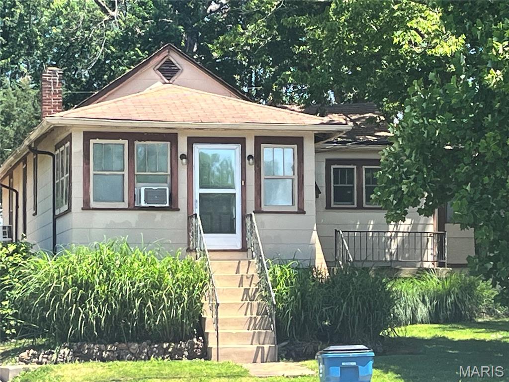 Attention Investors:  This property is to be sold as a package that includes 4938, 4942, and 4950 Lemay Ferry Rd. Combined package list price is $600,000.   All properties to be sold as is.  Showings only after an accepted contract. 4938 and 4942 are tenant occupied and are income producing properties with good long term tenants that may like to stay.   Do NOT disturb tenants.