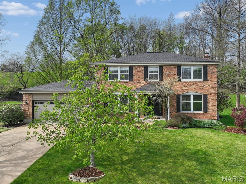 Quiet Luxury Living!!!
Imagine living in a home where every window looks out to trees, common ground, and peaceful green space — all from a quiet cul-de-sac in a central location close to everything. This beautifully maintained 3-sides brick home offers privacy, natural light, and inviting spaces designed for everyday living and entertaining. Homes with a setting like this are consistently searched for but rarely found.
The main level features hardwood floors, crown molding, oversized windows, and an open flow from the living room to the family room. The updated kitchen includes granite countertops, custom oversized refrigerator, bay window, and French doors leading to a stamped concrete patio and professionally terraced landscaping. One of the most unique features of the home is the updated transition from the kitchen into the family room, creating a more open concept feel while still maintaining defined and comfortable living spaces. This area also includes a coffee bar/wet bar space complete with a Sub-Zero beverage refrigerator and built-in ice maker, making it an ideal setup for entertaining, holidays, and everyday convenience. The family room connects to a spacious screened porch, creating the perfect indoor-outdoor lifestyle.
The backyard is incredibly private and scenic, adjoining expansive common ground with an opening just beyond the terraced landscape wall, creating space for play, exploring, and enjoying the outdoors. In addition, this lot’s unique appeal is amplified by another common area across the street offering a peaceful, open, park-like setting.
Upstairs you’ll find a primary suite with walk-in closet, Jacuzzi tub, shower, and updated vanity, plus three additional bedrooms and full bath. The finished lower level includes a large rec area, projector screen, study/reading nook, and excellent storage space, along with unfinished storage area for organization and seasonal items. Zoned HVAC, newer roof, updated systems, and Parkway Schools make this home an exceptional opportunity.
Situated within a socially active subdivision, highly regarded Parkway School District and top-rated Blue Ribbon award-winning Barretts Elementary, this home offers an ideal blend of everyday convenience and peaceful surroundings. Enjoy quick access to Highways 270, 40, and 44, ensuring an effortless commute. A rare combination of setting, privacy, and thoughtful updates makes this home a standout in every way!