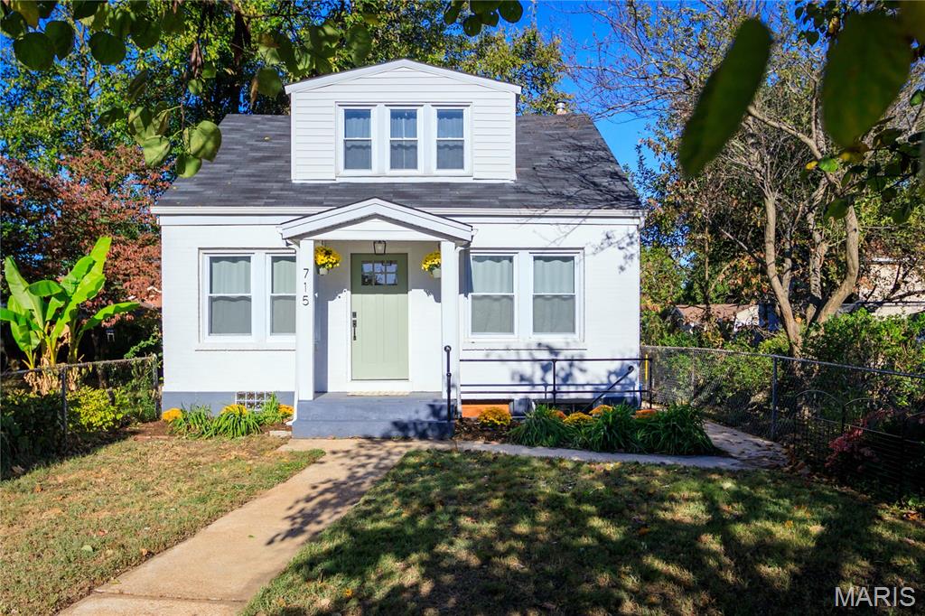 Fall in love with this charming brick bungalow on a quiet street surrounded by wonderful neighbors.
This delightful home blends timeless character with thoughtful updates, offering a spacious master suite, sun-filled living spaces, and warm original details like gleaming hardwood floors.

You’ll appreciate modern comforts throughout — including a fully updated kitchen, bathrooms, windows, and roof — all seamlessly integrated with the home’s classic charm.

Even with its beautiful upgrades, this home remains a canvas for your personal touch. Enjoy bright, neutral walls ready for your style, a flexible second bedroom perfect for a home office, guest room, or studio, and a basement ready to finish for extra living space — the possibilities are endless!

715 Erskine is where comfort meets convenience — a low-maintenance gem ideal for busy professionals or couples looking for a stylish, move-in-ready home with plenty of personality.