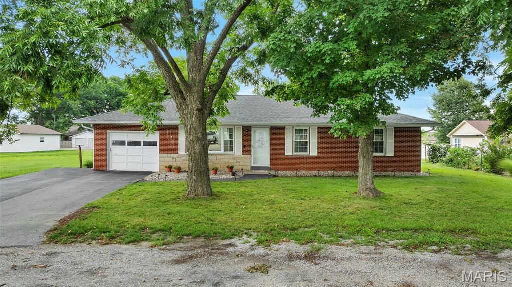 The updates are done, the next chapter is yours. This well-maintained full brick ranch offers 3 bedrooms, 1 bath, and 1,204 sqft on a spacious 0.28-acre lot in the heart of Red Bud! Nearly every major-ticket item has already been replaced, including the HVAC (2021), roof (2022), sewer line to the street (2023), water heater (2022), kitchen appliances (2021), windows (2023), exterior doors (2021), interior doors (2024), and professionally stabilized foundation with perimeter and center piers by Helitech. A full unfinished basement provides excellent storage or future living space. If you're looking for a home that's been truly cared for, where the big investments have already been made, 110 Braun St is one you won't want to miss!