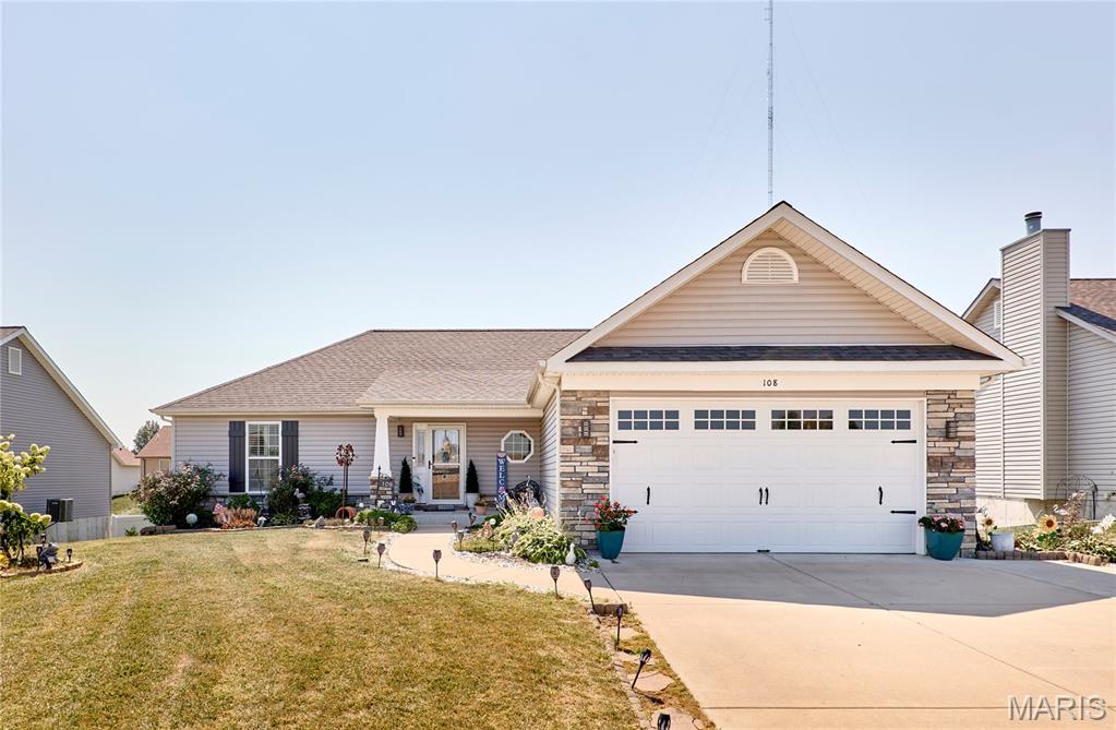 Welcome to 108 Quail Creek Dr! This spacious 7-year-old home offers 4 bedrooms and 3 full bathrooms with a bright, open floor plan designed for comfortable everyday living. The main level features 3 bedrooms and 2 bathrooms, including a spacious primary suite with a large walk-in closet complete with built-in storage. Vaulted ceilings and the split-bedroom layout create an open, airy feel with plenty of natural light throughout.
The kitchen is sure to impress with beautiful granite countertops, ample workspace, and a large walk-in pantry offering plenty of additional storage. Step outside to enjoy the deck and patio, perfect for relaxing or entertaining, along with a hot tub that will remain with the home.
The finished walkout basement adds even more living space with an additional bedroom and full bathroom, recreation room, and cozy reading nook. A set of double man doors provides convenient access for storing a mower, lawn equipment, tools, or other outdoor items. With generous living spaces inside and out, this well-maintained home offers the room and features you’ve been looking for!