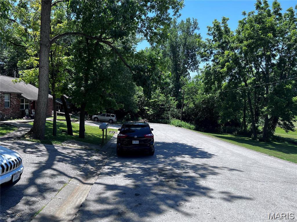 Developer's dream! Incredible opportunity to purchase just over 5 ACRES of land - right next to the GOLF COURSE! This property is one of the very few pieces of undeveloped land in Hannibal zoned MULTI-FAMILY. Imagine the possibilities, duplexes, golf course resort style living, or a single-family home with a large amount of acreage right inside of town. Are you ready to make your dream come to life?