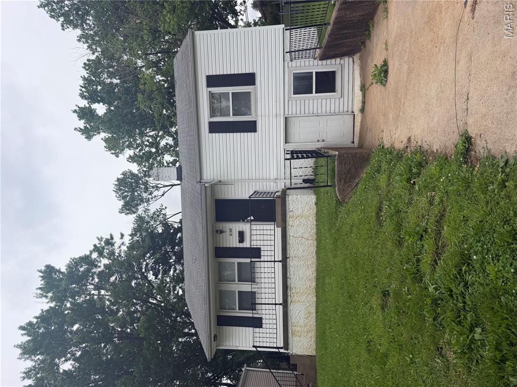 Welcome to 2049 Coleridge Drive! This charming 1941-built bungalow offers 1,017 sq. ft. of efficient living space in the heart of Jennings. Featuring a classic 3-bedroom, 1-bathroom layout, this home boasts original oak hardwoods, a spacious living room, and an eat-in kitchen. The full basement provides ample storage or future finishing potential. Situated on a level 5,502 sq. ft. lot, the property includes off-street parking and a manageable backyard. Located in the Sunnydale subdivision, you are minutes from local parks, Save A Lot, and easy I-70 access.