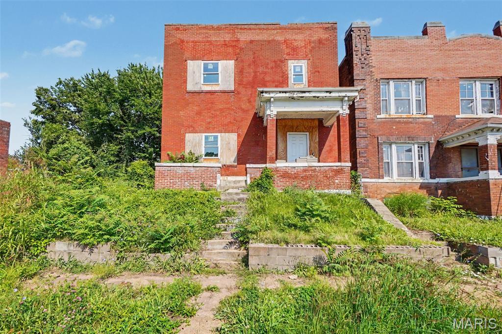 Exceptional Investor Opportunity with Outstanding ARV Potential! This stately brick home offers the rare chance to restore a property with remarkable historic character at an incredible entry price. Significantly larger than many renovated homes currently selling in the area, this property provides the square footage, architectural details, and upside investors seek when pursuing a high-value renovation. Much of the interior demolition has already been completed, allowing buyers to clearly envision the possibilities and begin planning the next phase of restoration.

From the moment you step inside, you'll discover timeless craftsmanship waiting to be brought back to life. Impressive original millwork, a grand staircase, soaring ceilings, oversized rooms, and period architectural details provide the foundation for an exceptional restoration. The exposed basement offers buyers an excellent opportunity to evaluate the home's construction while planning their renovation.

One of the home's most distinctive features is its original oversized window openings. At some point, smaller replacement windows were installed within the original masonry openings, but the expansive openings remain intact, presenting the opportunity to restore the home's original scale, dramatically increase natural light, and recreate the stunning appearance these rooms were originally designed to showcase. The current front entrance also offers tremendous potential, with the opportunity to replace it with a grand period-inspired entry that complements the home's historic architecture and dramatically enhances curb appeal.

Located in an area experiencing substantial reinvestment and redevelopment following the 2025 tornado, this property is positioned in a neighborhood attracting renewed investor interest. While many nearby properties sustained significant storm damage, this home does not appear to have experienced the same level of damage, allowing the next owner to focus on restoring its historic character rather than rebuilding from catastrophic loss.

Whether your vision is a profitable resale, an income-producing rental, being part of a major revitalization of North City, or the restoration of a beautiful historic residence for yourself on an FHA 203(k) renovation loan, the opportunity here is exceptional. The combination of generous square footage, preserved architectural character, and strong after-repair value potential makes this a project worthy of investment. Restore the craftsmanship, reopen the grand window openings, create an impressive front facade, and transform this property into one of the neighborhood's standout homes.

Properties offering this combination of size, character, and upside are becoming increasingly difficult to find. Sold AS IS. Seller to make no repairs or provide inspections. Bring your contractor, your vision, and your imagination to unlock the full potential of this remarkable investment opportunity.