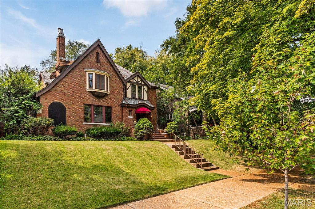 Built in 1926 and held by just three families in nearly a century, this Arts and Crafts home sits on one of the neighborhood's prettiest tree lined boulevards, just blocks from Carondelet Park. Four bedrooms, and everything that makes these houses special has been kept intact: rich original woodwork, stained glass, original chandeliers, and a stunning fireplace anchoring the living room. The updated kitchen brings modern function to the mix, and the full bath offers both a separate shower and a jetted tub, with a convenient half bath as well. An attached screened porch makes a perfect spot to unwind, and the generous flat backyard leaves plenty of room to garden, play, or entertain. A slate roof and two car garage round out a home that has been genuinely well cared for. Come see it before it's gone.