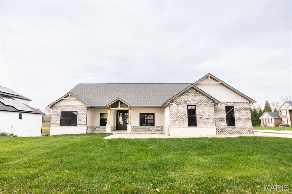 This beautifully designed four-bedroom ranch offers an open-concept layout with vaulted ceilings in the main living area, creating a bright and inviting atmosphere. The spacious kitchen features custom cabinetry and an oversized island, perfect for entertaining or everyday living. A split-bedroom floor plan provides privacy and functionality, with 9-foot ceilings enhancing the sense of space in each bedroom. The three-car garage offers ample storage, while the unfinished walk-out basement presents endless possibilities for future living space or customization. Situated on a desirable corner lot, this home combines thoughtful design, comfort, and potential. Agent Interest