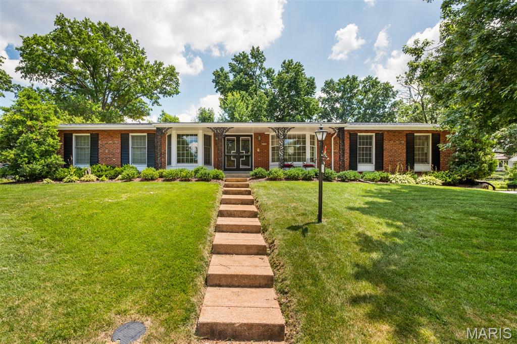 Welcome home to this charming brick ranch in sought after Warson Woods! Featuring 3 bedrooms and 2 full baths and nearly 1,800 square feet of comfortable living space, this home offers spacious living areas, timeless character and a generous lot perfect for entertaining, gardening or relaxing. Lower level is unfinished so you can finish it as you like and make it your own design.
Conveniently located near shopping, dining, parks and major highways. This is a wonderful opportunity to enjoy one of St. Louis County's most desirable communities.
