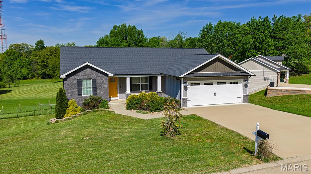As current and carefree as new construction - without the new construction sticker shock, and with an already-finished basement! This stunning property is a rare find for Jackson buyers. Sitting on just under an acre, fenced and looking across open ground, you’ll love the setting. And inside? What a beauty. Open concept, with sparkling natural light and a bright kitchen with granite countertops and an island. Ample seating focuses around a versatile and inviting electric fireplace, with flexible space for dining too. The living area separates a generous primary suite and laundry area from the other two bedrooms and hall bath. On the lower walkout level is a large family room, a fourth bedroom and full bath - and lots of storage. This lovely home can be found just up from East Elementary with easy access to I55, Jackson and Cape. You may just find yourself calling this rare find “home!”