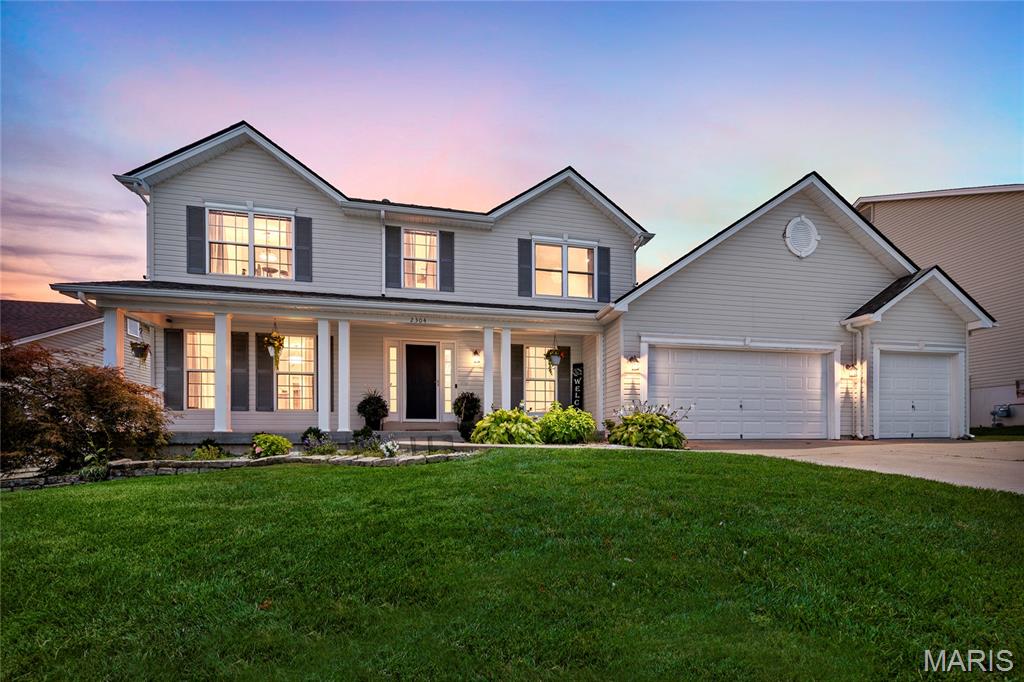 Beautiful 4-Bedroom Two-Story in The Fountains at Bear Creek.  Located within the highly sought-after Wabash/North Point boundaries of the Wentzville School District, 2304 Bear Fountain Run is ready to welcome you home!  A sprawling 4x32 covered front porch, surrounded by mature landscaping, offers wonderful curb appeal. Step inside to be greeted by warm hardwood floors in the entryway. The layout flows beautifully, featuring a great room that connects to the formal dining room through elegant decorative columns. At the heart of the home is the kitchen with a center island, opening directly into the breakfast room and a cozy family room. The family room boasts a large bay window and a striking whitewashed-brick, wood-burning fireplace. A convenient half bath and main-floor laundry complete the first level.  Step through the sliding glass doors off the breakfast room to find a generous 15x18 deck, perfect for entertaining or relaxing in your fenced backyard.  Upstairs, you will find a spacious primary suite complete with a walk-in closet and an en-suite bath featuring a double vanity, separate shower, soaking tub, and a private linen closet. The second floor also offers well-sized additional bedrooms and a full hall bathroom with its own linen closet.
The partially finished lower level adds even more versatile living space, including a third full bathroom, while still leaving plenty of room for storage in the unfinished area.