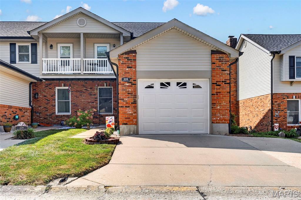 Welcome to 222 Deer Hollow Ct! This beautifully refreshed end-unit townhouse offers an excellent opportunity for a first-time buyer, downsizer, or anyone looking for low-maintenance living in O'Fallon. Fresh paint throughout creates a clean, inviting feel, while a new roof, gutters, and siding provide valuable peace of mind for years to come.

The main level features a spacious family room, kitchen/breakfast area, convenient main-floor laundry, and a wonderful 16 x 16 Four Season Room—a versatile space perfect for relaxing, entertaining, or enjoying your morning coffee. The Four Season Room opens to your own private patio and outdoor space.

Upstairs, you'll find a spacious primary suite with a large walk-in closet and private bath. The second generously sized bedroom offers the added bonus of walking out to a private balcony. A partially finished lower level provides additional space for a recreation room, home office, hobbies, or storage.

Additional highlights include a 1-car attached garage and double-wide driveway, providing plenty of parking. As an end unit, this home offers added privacy and a desirable location within the community.

With major exterior updates already completed and plenty of flexible living space, 222 Deer Hollow Ct is a fantastic opportunity to make O'Fallon living your own! Don't miss your chance, schedule your showing today!