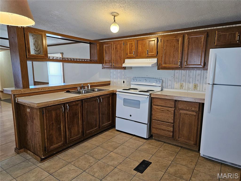 M A Dennis - Residential