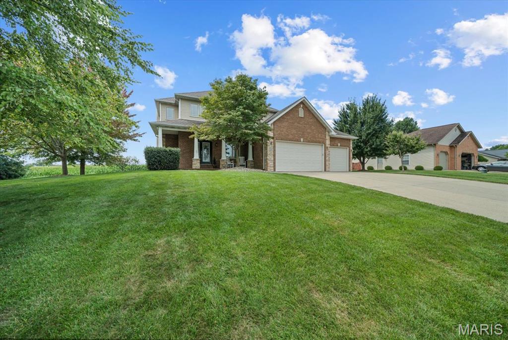 Welcome to the sought-after St. Jacob lake community, where small-town charm meets comfortable everyday living. Tucked into the established neighborhood of Manors of Kensington Parque, this home offers an inviting setting with the space, style, and convenience you are looking for. This home offers an easy flow for both daily routines and special gatherings. Bright living areas create a welcoming first impression, while the kitchen and dining spaces are ideal for everything from quiet mornings to casual entertaining. A private primary ensuite and 3 more generous upper-level bedrooms provide restful retreats, flexible living space that gives you room to work, relax, host, or personalize the home to fit your lifestyle.  The finished lower level adds extra room for the kids, gaming or guests. Outside, the property’s location adds to the appeal, offering a residential feel while keeping you close to local conveniences. Located within the Triad School District and just a short drive to Edwardsville, Scott Air Force Base, and downtown St. Louis, this home offers the perfect balance of quiet small-town living with convenient access to everything the Metro East has to offer. Whether you are looking for a place to settle in, entertain, or enjoy a quieter pace, this address delivers a warm and versatile backdrop for your next chapter. Private lake access available to all homeowners.