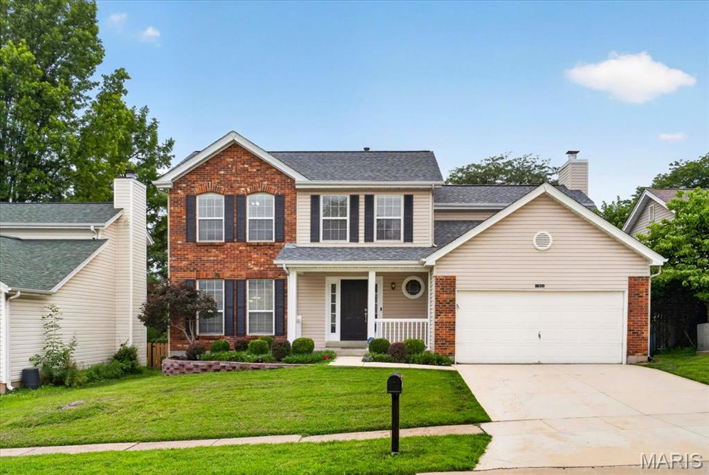 Ideally located in the sought after Polo Parc neighborhood, just minutes from Creve Coeur Lake and within the Parkway School District, this extensively updated two story residence delivers timeless character paired with thoughtful modern updates, an exceptional combination in today's market.

Set on a fenced, level homesite with a sprawling patio and professionally landscaped grounds, the home welcomes you with freshly painted interiors and rich hardwood flooring throughout the main level. The gracious L shaped living and dining room offers versatile space for both everyday living and formal entertaining, and a convenient powder room completes the main floor.

At the heart of the home, the gourmet kitchen showcases 42 inch raised panel maple cabinetry, luxurious Corian countertops, and a gas range ready for the discerning home chef. The adjoining breakfast room, framed by a charming bay window, overlooks the patio and invites casual morning gatherings. From here, the kitchen opens effortlessly into a sunken family room, where another bay window and a classic wood burning fireplace create a warm, inviting centerpiece for the home.

Upstairs, four spacious bedrooms await, anchored by a luxurious primary suite complete with a spa inspired bath featuring a separate soaking tub and shower, a true retreat at the end of the day.
The finished lower level extends the home's living space even further, offering flexibility for a media room, home gym, or recreation area. An additional sleeping room provides the perfect space for guests, extended family, or a private home office, complemented by its own finished bathroom for added convenience. A dedicated laundry and utility room rounds out this exceptional lower level.

Refined details continue throughout, including a new roof installed in 2025, ceiling fans in the family room and all four bedrooms, elegant two inch white plantation blinds, classic six panel white doors, a private white vinyl fenced rear yard, and beautifully landscaped grounds that greet you from the moment you arrive.

Just minutes from major highways and a short drive to parks, shopping, dining, and the lake, this thoughtfully updated and impeccably maintained home offers a rare opportunity to enjoy sophisticated living in one of the area's most desirable communities.