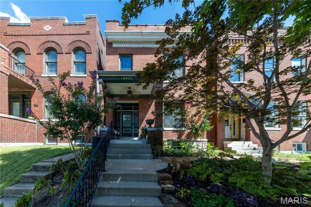 Located on a quiet street just around the corner from The Grove entertainment district, this thoughtfully renovated historic home combines modern comfort with the character and craftsmanship of its original design. Restaurants, bars, breweries, coffee shops, retail, Forest Park, and the nearby BJH/WUSTL medical campus are all just a short walk away.

The home was extensively rehabbed by its owners with a focus on preserving its historic character while updating the systems and spaces for modern living. Inside, high ceilings, original architectural details, restored original woodwork, and oversized pocket doors reflect the home's historic roots. The main level offers an open flow between the kitchen, living room, dining room, and bonus bar area, creating a space that works equally well for everyday living and entertaining. Major improvements include many new systems, a kitchen remodel, primary bath remodel, a new roof, tuckpointing, lateral sewer line replacement, 2nd floor laundry, and a full front porch rebuild.

Throughout the home, details were carefully considered. The kitchen features custom Amish-built solid wood cabinetry, a Viking gas range, and ample space for cooking and gathering. The large primary suite serves as a comfortable retreat with custom built-in closets and a well-appointed en suite bath featuring heated marble floors, a soaking tub, bidet, and large walk-in shower with seating.  Both the kitchen and primary suite have fireplaces (electric).  The entry/front room has a non-functional fireplace/mantle.

The backyard features a beautiful and shaded bluestone courtyard as well as a large, covered deck and extensive landscaping. Unusual for the city, this thoughtfully designed outdoor retreat offers a private escape that extends the living space and provides an ideal setting for entertaining and relaxing throughout the seasons.

City living at its finest.  Pictures don't do it justice, come have a look! 

Full 3D scan / virtual tour is available, inquire for link if your platform is not showing it for you.  Disclosures, floor plans, and list of improvements are also available.  Owners would consider selling most of the furniture.