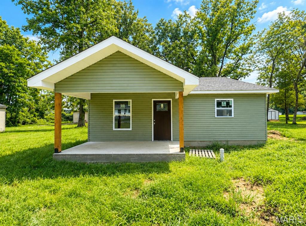 New Construction!! This home will go USDA, VA, & FHA loans! Adorable 3-bedroom, 2 full baths, 1320 sq. ft. home on a paved road. Home is almost completed and will have a kitchen island, laminate floors, all electric, a large laundry room, a covered front porch, and an open kitchen/ living room. Affordable and Low Maintenance!!