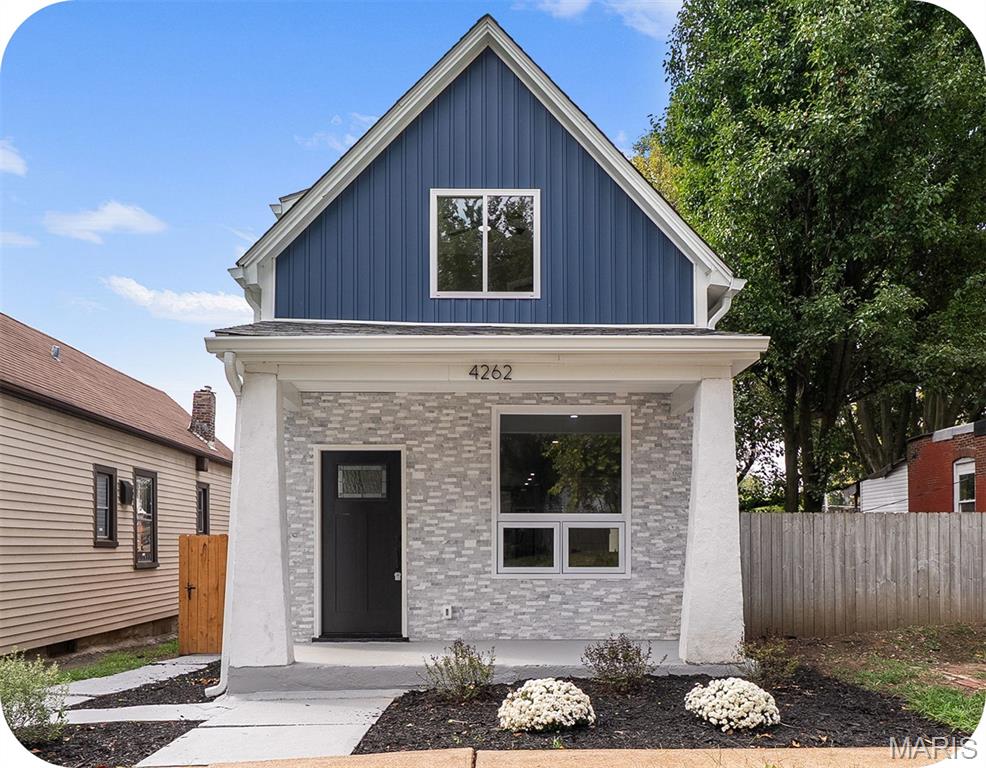 Historic charm meets effortless modern living in this beautifully renovated 1894 home! Thoughtfully transformed from top to bottom, this stunning Tower Grove South residence leaves no stone unturned while preserving the character that makes an older home special. Step inside to a bright, inviting open floor plan anchored by a dramatic picture window in the living room. The dining room adds a touch of fun with its stylish built-in bar, perfect for entertaining. The show-stopping kitchen features all new custom cabinetry, Carrara marble countertops, and stainless appliances and leads to a nice, spacious deck--ideal for morning coffee, summer dinners, and gathering with family and friends. The main level offers exceptional convenience with a comfortable bedroom and attached full bath. Upstairs, retreat to the luxurious primary suite, complete with a generous walk-in closet and spa-inspired en suite bathroom featuring a dual vanity and large shower. An additional bedroom, full bath, and laundry closet round out the second level. Outside, enjoy a quaint backyard and convenient two-car parking pad. Nestled in the heart of Tower Grove South, you're just moments from popular restaurants, bars, and the neighborhood energy of the Morganford strip, with Tower Grove Park practically at your doorstep. Historic character, fresh modern style, and an unbeatable location -- just move in and enjoy!