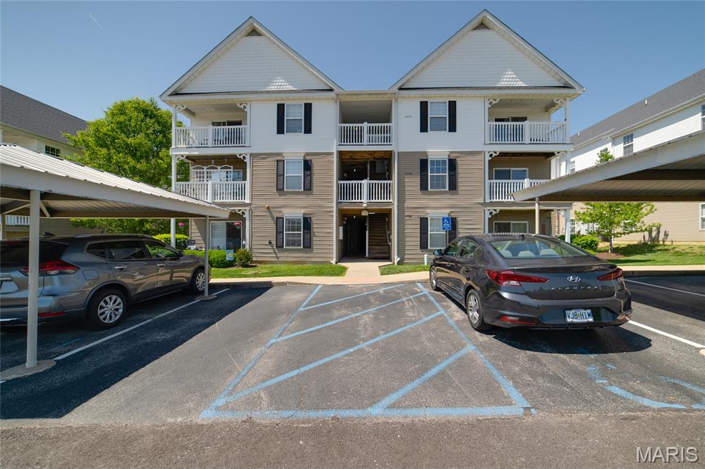 **New AC & Furnace installed 6.15.2026!** includes 5 year warranty transferrable to new owner.
Welcome home to this beautiful Springhurst Terrace condo!  Bright and spacious ground floor condo offers 2 BR, 2Baths. Cheery and bright living room/dining room is great for entertaining. Kitchen includes ample counterspace and lots of cabinets. Primary suite offers a large bathroom with dual sinks and walk-in shower. Walk in closet w/organizers finish off the primary suite.  2nd bedroom (set up as an office) is roomy and has a good size closet. Easy access to 2nd bathroom that has a tub/shower combo. Newly updated light fixtures throughout and decorative wainscoting in dining room. Laundry closet is conveniently located to both bedrooms. All appliances included as well as full size washer and dryer. Patio doors open to retreat on the covered patio with outdoor storage closet. 1 covered parking spot included in property ownership. HOA monthly fee includes water, sewer, trash, as well as snow removal and lawn maintenance. Quick access to Hwys I-40-64, Hwy N, and I-364 and also convenient to shopping & restaurants.**Yearly Master HOA Board Fee paid for 2026!**