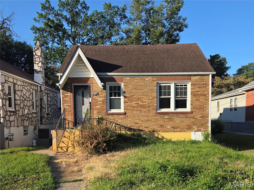 Opportunity awaits at 6990 Edison Avenue! This classic brick bungalow offers two bedrooms, one full bathroom and a partially finished basement with the potential to create additional living space. The lower level may also provide an opportunity for a third bedroom, subject to applicable permits, egress requirements and local building codes. This property is an excellent option for an owner-occupant ready to put in some sweat equity and personalize a home or an investor seeking an affordable addition to a rental portfolio. Once repaired and updated, estimated market rent is approximately $1,050 to $1,200 per month, depending on the quality of finishes, property condition, included amenities and tenant-paid utilities. Bring your ideas and unlock the potential of this solid St. Louis brick home. Schedule your showing today!