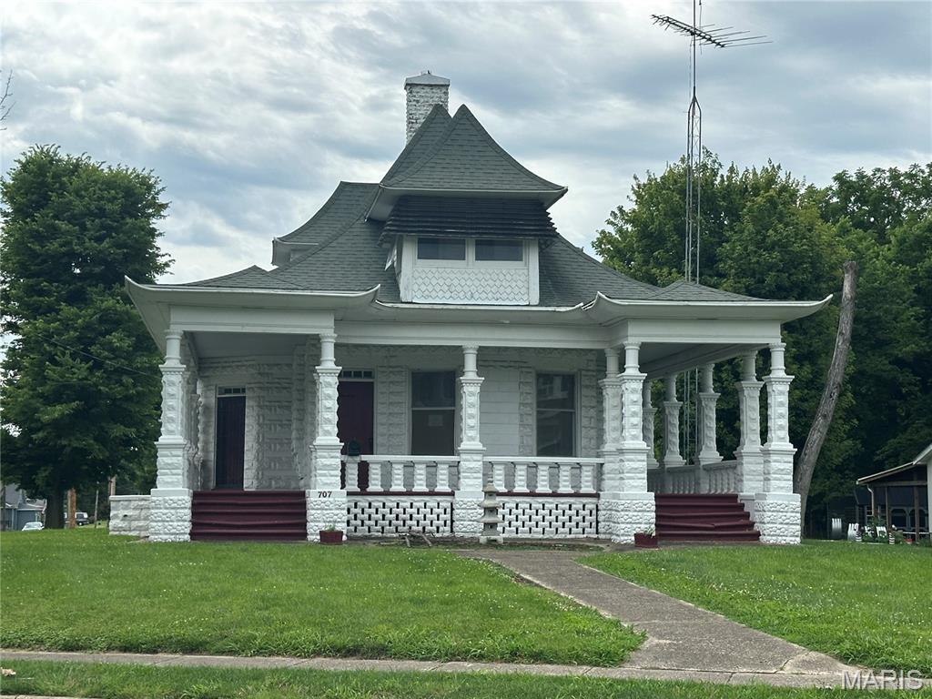This uniquely designed 20th-century 1.5-story home blends modern updates with the character and charm of its original woodwork and trim. The main level features a spacious living room with a fireplace, a formal dining room, an office/den, an updated kitchen with a convenient laundry closet, one bedroom, and two updated bathrooms. The upper level offers two additional comfortable size bedrooms. Additional amenities include covered front porches with two separate stairways, a rear porch, central heating and air conditioning (currently not operational), and a detached two-car garage. Although some updates have been completed over the years, bring your HGTV skills and vision to transform this house into the home of your dreams! This property may qualify for seller Financing(vendee). ***Due to the condition, the property may have health/safety risk(s). Prior to entry / access, all parties must sign a Hold Harmless Agreement, and the property may only be shown by appointment”.