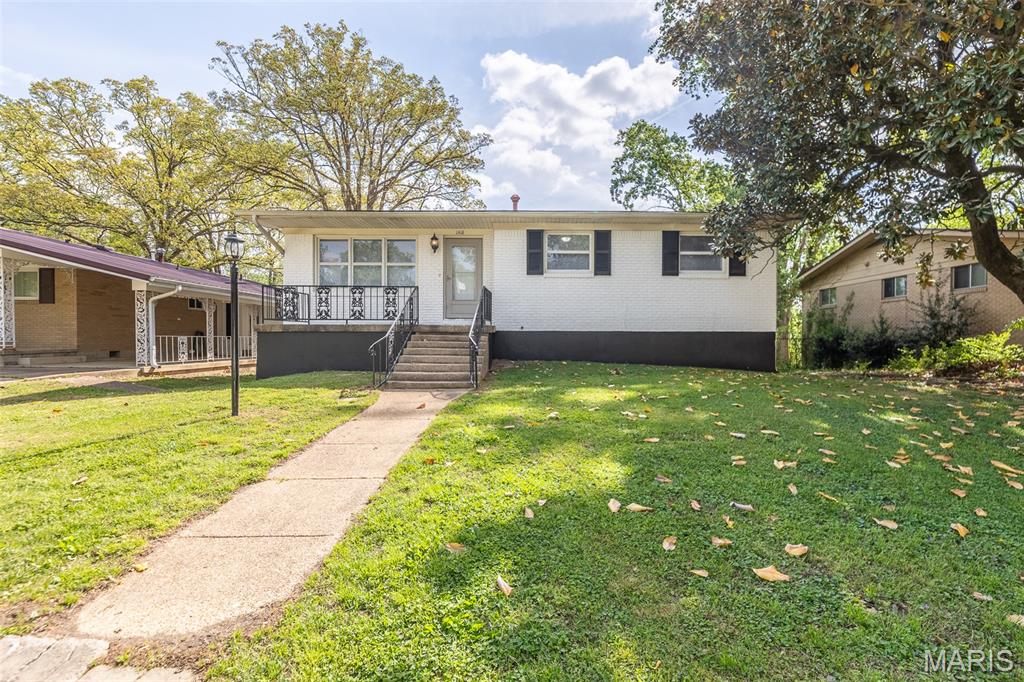 Fully remodeled and move-in ready, this spacious 5-bedroom, 2.5-bath home offers the perfect blend of modern updates and functional living. Featuring a full finished walkout basement, the home provides multiple living areas, including a second living space ideal for entertaining, relaxing, or accommodating guests. The main-level owner’s suite adds convenience and privacy, while the additional bedrooms offer generous space throughout. The updated kitchen showcases modern finishes and includes stainless steel appliances, creating a clean, stylish centerpiece for the home. You’ll appreciate the abundance of storage options, well-designed layout, and contemporary color palette carried throughout. Outside, the property offers private alley access, covered parking, and added convenience rarely found at this price point. With its recent renovations and strong overall condition, this home is well-suited to meet a variety of financing options, including government-backed loan programs. Priced to sell and ready for its next owner—this is one you won’t want to miss.