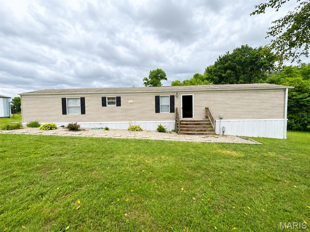 Escape to the countryside to this 2010, Clayton home situated on 15 beautiful acres in Rinard, Illinois. Offering roughly 1,152 square feet of comfortable living space, this home features 3 bedrooms and 2 full bathrooms, making it ideal for families or anyone looking for room to spread out.
The home comes complete with all appliances included, allowing for a seamless move-in experience. Outside, the property truly shines with 15 acres of fenced pasture, perfectly suited for horses, cattle, or other livestock. Whether you're looking to start a small farm, expand your existing operation, or simply enjoy a rural lifestyle, this setup is ready to go.
An 864-square-foot barn provides ample space for equipment, feed storage, livestock shelter, or keeping your toys out of the weather. The barn is heated by a wood burner and has concrete floors.
 The combination of open pasture, quality fencing, and several other improvements, makes this property an excellent opportunity for anyone seeking a place to live and have livestock.
If you've been searching for an affordable country property with acreage, ready to go pasture, and a comfortable home, this one deserves a look!