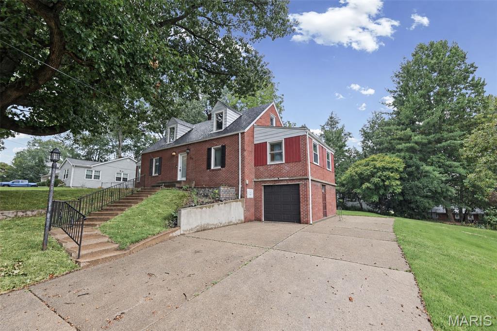 Beautiful home on a corner lot in Rosewood Heights (Roxana School District) includes a remodeled kitchen with soft-close cabinets/drawers, beautiful brick sunroom off the side of the house that exits to the fenced in yard, finished basement with a full bath and wet bar. Updates include: Roof 2025, A/C 2023, Water Heater 2021, Dishwasher 2024, Garage Door 2024, Fridge 2022. Also includes Parcel 19-2-08-15-20-402-006.001 in the sale. Call your favorite agent for a showing.