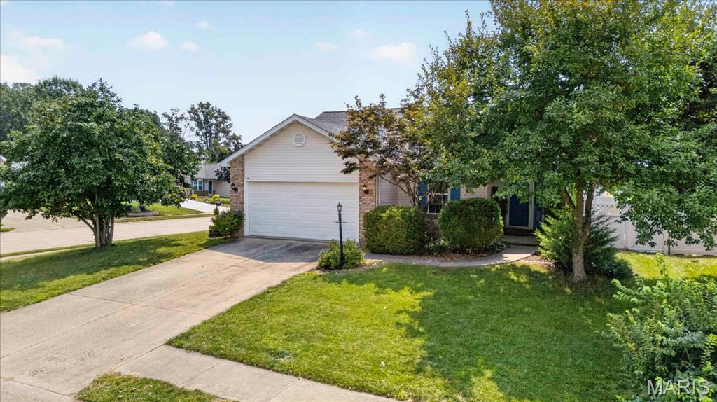 3-Bedroom, 3-Bathroom gem in Huntington Place - A prime location near shops, dining, schools, and interstates with direct bike trail access. You'll love the flow of the open layout connecting living, dining, and kitchen areas. Step out to a spacious stamped patio, extensively landscaped, fenced yard, ideal for enjoying the outdoors or gatherings with friends. Interior features include a cozy wood-burning fireplace, updated kitchen with a pantry, and newer refrigerator & stove, stainless appliances, and a serene master suite with an updated private bath, walk-in closet, and backyard access. The lower level offers a theater room, bonus room, an impressive bar, and bathroom. Upgrades include many light fixtures, some smart blinds & fans, tankless water heater, water softener, whole house humidifier and radon mitigation system. Refrigerator and Stove/Oven were installed two years ago and come with an extended warranty. Audio & Visual equipment in use.