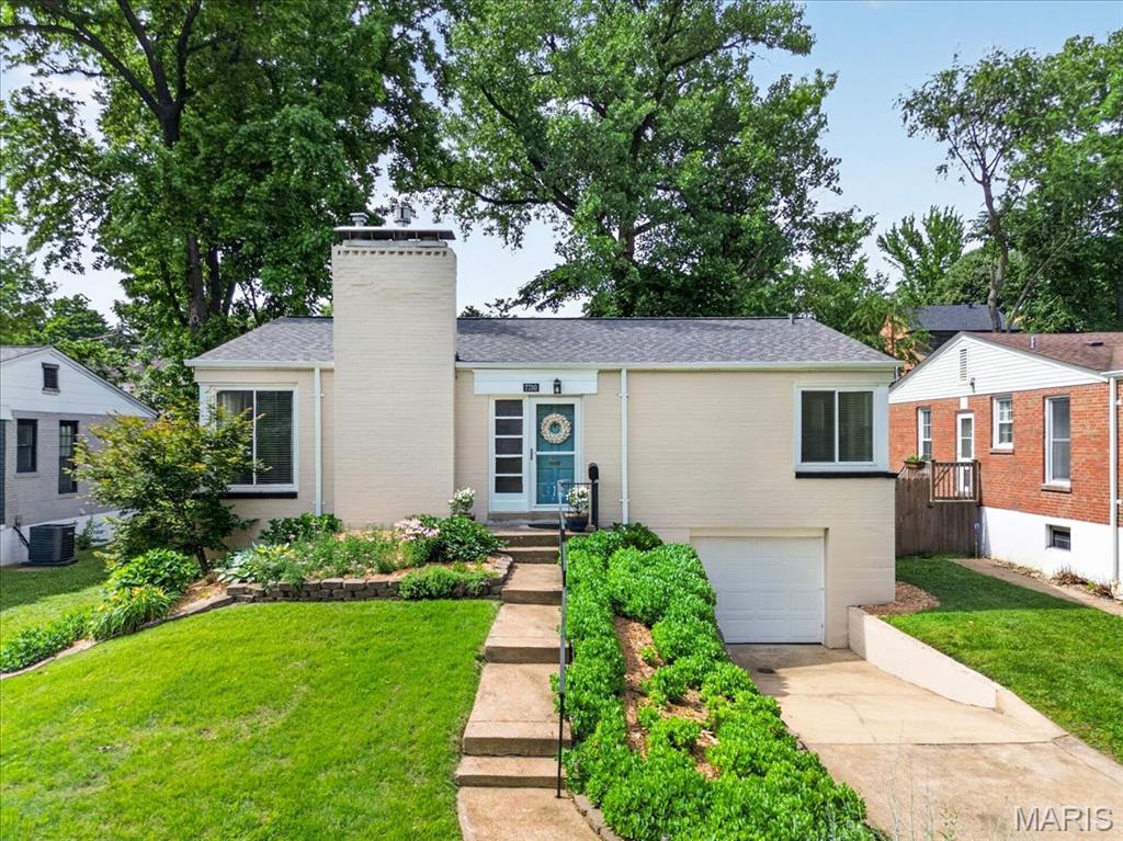 Welcome to this charming bungalow in the heart of University City! Boasting exceptional curb appeal and a warm, inviting interior, this move-in-ready home seamlessly blends character, comfort, and convenience. Beautiful hardwood floors flow throughout the main level, featuring a spacious living room anchored by a cozy gas fireplace, a separate dining room perfect for entertaining, and a well-appointed kitchen with abundant cabinet and storage space.

Two comfortable bedrooms and a full bath complete the main level, offering flexibility for guests, a home office, or everyday living. Step outside to enjoy the private covered deck overlooking the fenced backyard—an ideal setting for morning coffee, outdoor dining, gardening, or gathering with family and friends.

Recent updates include a new roof in 2025, along with additional improvements that enhance both value and peace of mind. The expansive walk-out lower level provides excellent storage and endless possibilities for future finishing or additional living space. An oversized tuck-under tandem garage offers added convenience and room for vehicles, hobbies, or extra storage.

Ideally located in sought-after University City, this home is just minutes from parks, restaurants, shopping, and entertainment. Enjoy easy access to the vibrant Delmar Loop, known for its dining, cultural attractions, and nightlife. With convenient proximity to I-170 and I-64, commuting to downtown St. Louis, Clayton, Washington University, and surrounding areas is quick and easy.

Don't miss this wonderful opportunity to own a charming University City home in an unbeatable location!