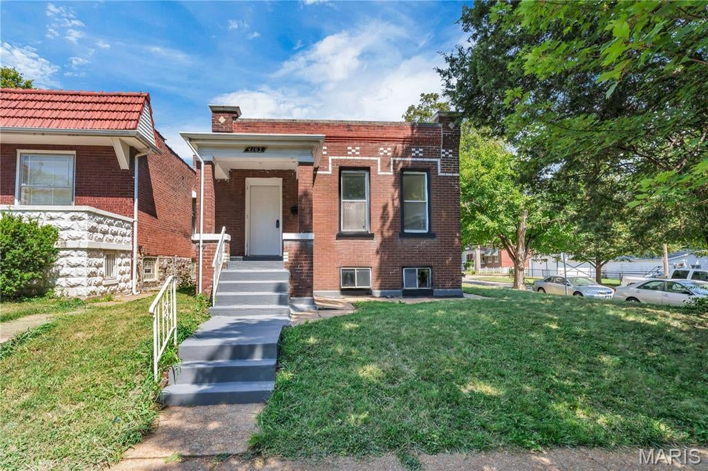 Welcome to 4163 Walsh Street! This beautifully updated home offers 3 spacious bedrooms, 1 stylishly renovated bath, and an inviting open floor plan perfect for modern living. Step inside to find brand-new vinyl flooring throughout, fresh paint, new trim and doors, and elegant light fixtures that brighten every space. The stunning new kitchen boasts sleek cabinets and plenty of room to gather. Additional updates include a new garage door, furnace, and AC—ensuring comfort and peace of mind. The bathroom has been fully refreshed with contemporary finishes. Nestled in a wonderful neighborhood, this home is just minutes from highways, shopping, and restaurants, making it both convenient and desirable. Truly move-in ready and waiting for you!
