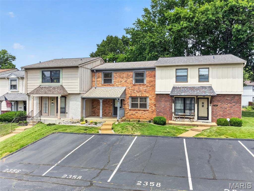 Great opportunity in Parkway Schools! Spread out over three floors in this move in ready townhouse. The large living room dining room combo features laminate flooring and bright windows. The fully equipped kitchen includes stainless steel appliances and access to the private deck. Upstairs you'll find a primary suite with walk-in closet and full bath. The guest bedroom is oversized and serviced by a hall bath. The walk out lower level has great storage, a large family room and utility space. This quiet community includes a swimming pool, tennis courts and club house. Updates include: HVAC (2021), water heater (2023), paint (2026), carpet (2026).