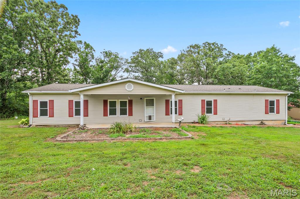 Escape to the peace and privacy of country living with this beautiful 4-bedroom, 3-bath home nestled on 5 scenic acres.  With an owners Suite and an in law suite. Offering the perfect combination of comfort, functionality, and energy efficiency, this property is ideal for those looking to enjoy nature without sacrificing modern conveniences.
Inside, you'll find a spacious living room with plenty of room to gather, relax, or entertain. Step outside onto the back deck and take in the tranquil surroundings while enjoying your morning coffee or evening sunsets.
The property includes a large pole barn, providing abundant space for vehicles, equipment, hobbies, or workshop projects. With 5 acres to explore, there's plenty of room for gardening, recreation, or simply enjoying your own private retreat.
Nature lovers will appreciate the abundance of wildlife that frequents the property. Deer, wild turkey, and a variety of birds can often be seen right from the deck, making this a wonderful place for outdoor enthusiasts, photographers, or anyone who enjoys the beauty of nature.
Adding to its appeal, the home is equipped with solar panels that help keep electric bills remarkably low, offering energy savings and long-term value.
Whether you're looking for a peaceful country home, a hobby farm, or a place to unwind surrounded by nature, this property offers endless possibilities. Don't miss your opportunity to own this unique slice of the countryside—schedule your private showing today!