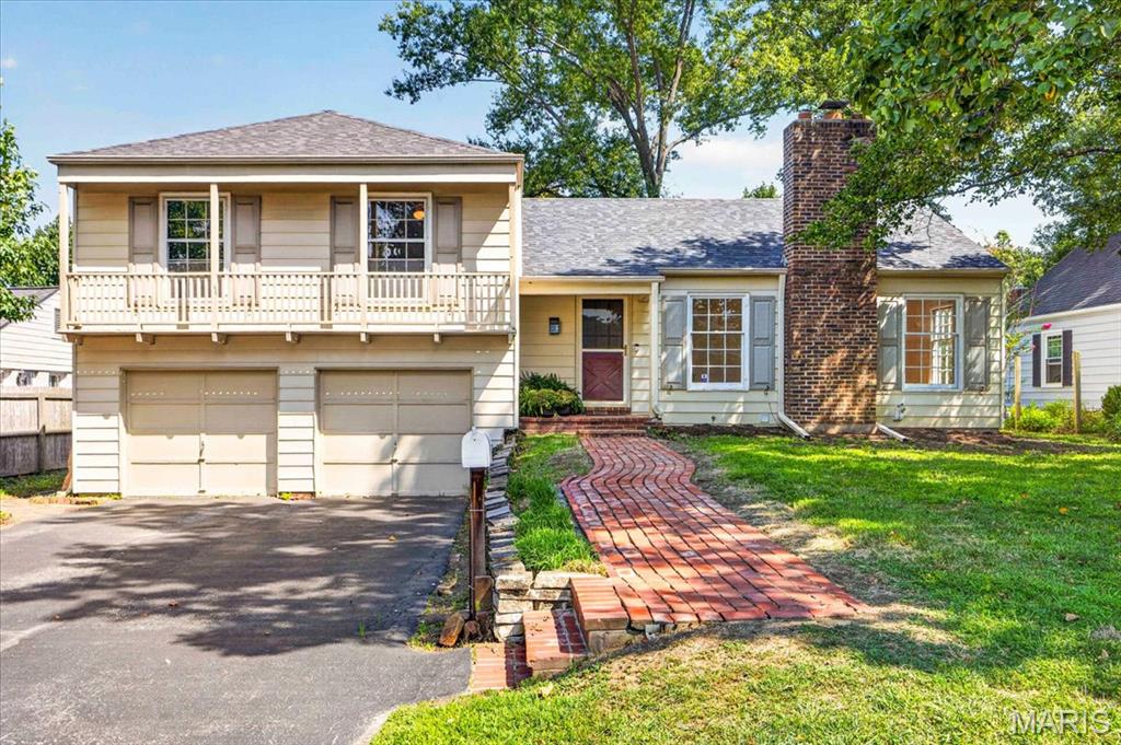 This 3 bedroom 2.5 bath is situated on a great cul de sac street in sought after neighborhood. Light streams into this spacious living room with built in bookcases and fireplace and separate dining room. Wood floors in Entry, Living room, dining room, hallway and all the bedrooms. 1/2 bath on main floor. Kitchen has plenty of counter space and tons of cabinets with access to backyard. The large family room is 5 steps down and opens to patio and yard. The 3 bedrooms and 2 baths are located 5 steps up from the entry foyer. They are all nice sized with the primary suite having a large walk in closet and full bath. There is a full basement through the 2 car garage that offers plenty of storage!  Stove, refrigerator, washer and dryer will stay but are as is. Property being sold "AS IS". New roof in 2025.
The possibilities are endless for this house and the neighborhood is awesome!!