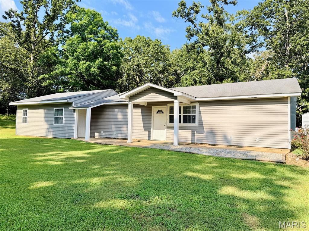 Welcome to peaceful country living on 5 beautiful acres just minutes from Doniphan, MO, with easy access off Highway 21. This spacious 3-bedroom, 2-bath home features a bright, open floor plan and a versatile bonus room that could serve as an office, playroom, or potential 4th bedroom. The property offers plenty of room for gardens, outdoor entertaining, and family gatherings around the fire pit, along with excellent bow hunting opportunities right in your own backyard. A 24’ x 30’ detached shop/garage with a wall A/C unit and propane heater provides year-round comfort for hobbies, storage, or projects. Enjoy the privacy of rural living while being just minutes from shopping, schools, and the Current River, where you can spend weekends floating, fishing, and making memories.
