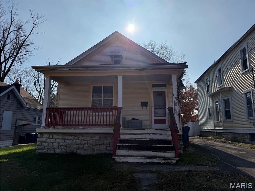 Step back in time to a home that is ready to be brought into the 21st century!. Main floor features living room, formal dining room, eat-in kitchen, 2 beds, and 1 bath. Original doors, woodwork, and trim throughout main level, including a pocket door between the living room and the dining room, - most of it all in great condition. Main floor also features high ceilings. Upstairs has a bonus room and easy access to the attic. Large covered front sitting porch on front and huge, covered, and screened enclosed back porch. Backyard is fenced. Electrical panel in basement has been updated.  Property to be sold As-Is. No appliances included.