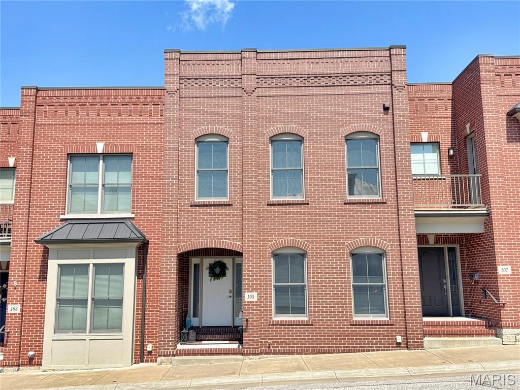 Downtown Washington Awaits! From monthly community events and weekly nightlife to shopping local businesses and walking the riverfront trail, you will fall in love with Washington's Small Town Charm & Downtown Walkability. This modern Townhome offers far more than just a place to call home with over 2,000sqft above grade, 2 Car Garage,  open design, back porch, and private elevator. After taking in the Main Street View, you walk through the front stoop and enter into an Open Living Space, which connects the Great Room, Dining Area, and Modern Kitchen. Granite Countertops, tall cabinets, center island, and Pantry are just a few features in the Kitchen. 
So Many High Quality Finishes make this Home Luxurious, while also Maintaining a 'Blank Canvas' simplicity. A True Must See! Upstairs you will find a sprawling Primary Suite with full bathroom and walk-in closet. The Spare Bedroom, Full Hall Bath, Office Nook, and Laundry Room are all down the Hall on the 2nd floor. A Flex space in Lower Level could function as Storage, Living Room, Gym, or Workshop, as it connects to the 2 car garage. The Back Deck is perfect for the enjoying your morning coffee, grilling on the weekend, and taking in the sunsets in the evening. Start Envisioning Your Dream Life in Downtown Washington MO, and Schedule Your Personal Tour!