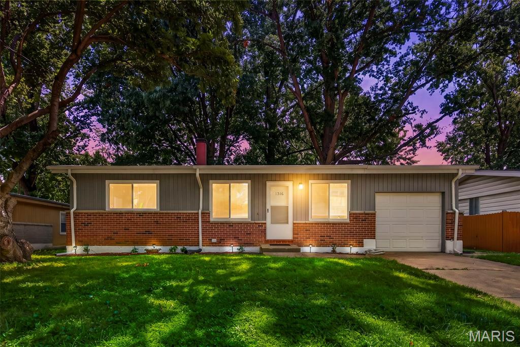 Welcome to this beautifully remodeled 3-bedroom ranch offering comfort, modern style, and efficiency! Exterior features a new architectural roof, new gutters, all new energy efficient windows to keep those utility bills down. 
You enter into a large living room dining room area boasting beautifully refinished hardwood floors that extend through all three main-level bedrooms. 
Inside, the spacious living and dining area features refinished hardwood floors The fully updated kitchen boasts updated countertops, and stainless steel appliances, opening to a sunlit breakfast nook, sunroom, and direct backyard access. The main level is complete with a renovated hallway full bath and a renovated private half bath off the primary suite.
The partially finished lower level features a unique wood-burning barrel fireplace—perfect for winter evenings—along with an expansive unfinished space ideal for storage or future expansion. Includes an attached 1-car garage. 
Schedule your private tour today!