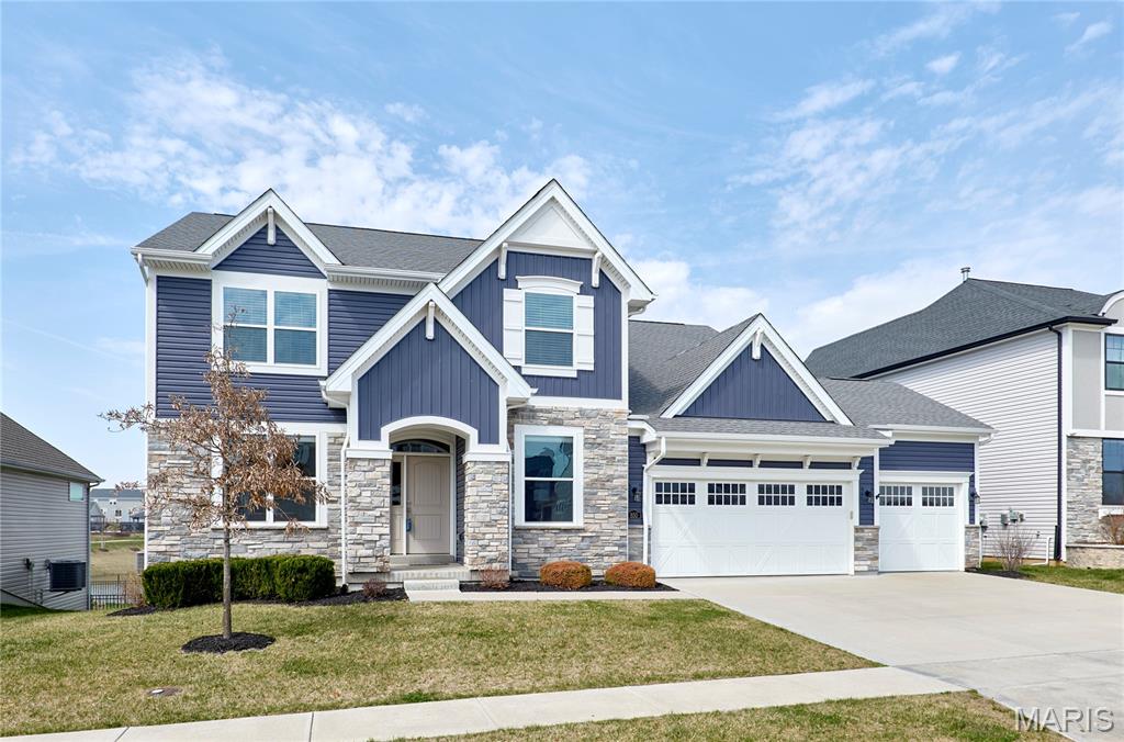 Don’t miss this luxurious, 4 years new 2-story home in the desirable Streets of Caledonia! Backing to a beautiful lake with walking paths, this home offers 5 bedrooms, 4 bathrooms, walk-out finished lower level, gorgeous kitchen, screened in porch, 3 car garage, open floor plan and so much more! Stunning curb appeal welcomes you into the open foyer boasting beautiful hardwood floors that flow into a large front office and light & bright dining room. The gorgeous kitchen is a chef’s dream boasting an abundance of custom cabinetry, huge island with breakfast bar, stainless steel appliances, large pantry, and coffee/wine dry bar areas. The spacious breakfast room is open to the kitchen and great room and offers access to the screened in porch overlooking the beautiful lake. The bright and airy great room boasts vaulted ceiling, hardwood floors, and gas log fireplace. Your primary bedroom suite on the main level features cozy carpeting, huge walk-in closet, and full bathroom with double sink vanity, beautifully tiled step-in shower, and linen closet. The main floor is complete with laundry room, a half bathroom, and mud room with built-in shelving. The gorgeous open staircase with hardwood landings invites you to the upper level which includes a large loft overlooking the spacious great room, 3 spacious bedrooms each with walk-in closets, and a full hall bathroom with double sink vanity and shower/tub combo. The finished lower level boasts the 5th bedroom with large walk-in closet and a spacious family room with walk-out access to the huge patio and level, fenced yard with gorgeous views. Ideally located just minutes from Lake St. Louis shopping & restaurants, Winghaven Country Club, and beautiful parks. Amazing neighborhood amenities include pool, clubhouse, fitness center, outdoor courts, playground, and walking paths. Don't miss your chance at luxury living in an amazing location!