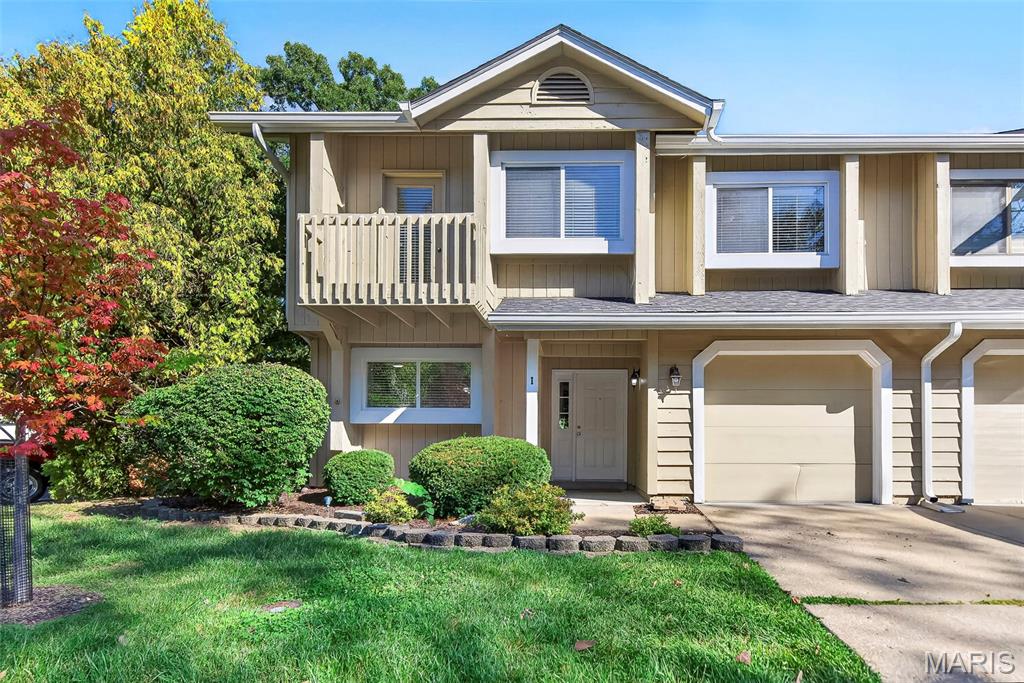 Welcome home to this beautiful 2-bedroom, 1.5-bath end-unit condo in Lake St. Louis, located in the Wentzville School District and serving Timberland High School! Filled with natural light and featuring soaring ceilings, skylights, charming architectural details, and inviting indoor and outdoor spaces, this home offers a layout that feels bright, open, and spacious from the moment you step inside.
Enter into the open floor plan where the kitchen features stainless steel appliances, a double oven, and a large window with a shelf spanning the width of the window—perfect for plants, or your favorite herbs. An adjoining dining area provides plenty of room for a kitchen table and flows directly into the impressive two-story living room.
The living room is the true heart of the home, featuring a dramatic two-story vaulted ceiling with two skylights that bring in an abundance of natural light. A wood-burning fireplace creates a cozy focal point, while built-in shelving adds character and convenient display space. Sliding glass doors lead directly to the back patio, creating an easy extension of the living space for entertaining, grilling, or simply relaxing outside. A 7' x 4' exterior storage closet provides additional space for seasonal, patio items, and more.
Head upstairs where the open railing overlooks the living room below, enhancing the home's airy, open feel. The primary bedroom features a private balcony overlooking the front yard, vaulted ceiling, two spacious closets, and another charming window shelf. The second bedroom also offers a vaulted ceiling, two closets, and its own window shelf.
The upstairs bathroom offers a unique and functional layout with a double-sink vanity in one area and a separate space featuring a soaking tub, separate shower, toilet, and skylight. A main-level half bath adds convenience for guests.
Storage continues into the garage, where wire shelving and wall hooks provide plenty of room to keep belongings organized. As an end unit, this condo also enjoys a desirable location within the community, with additional parking available in a nearby parking area.
Enjoy living in Lake St. Louis near the area's big lake while being conveniently located near shopping, dining, and everyday amenities. With its soaring ceilings, skylights, wood-burning fireplace, private balcony, patio, and light-filled interior, this condo has so much to offer.
Don’t miss out—schedule your showing today!