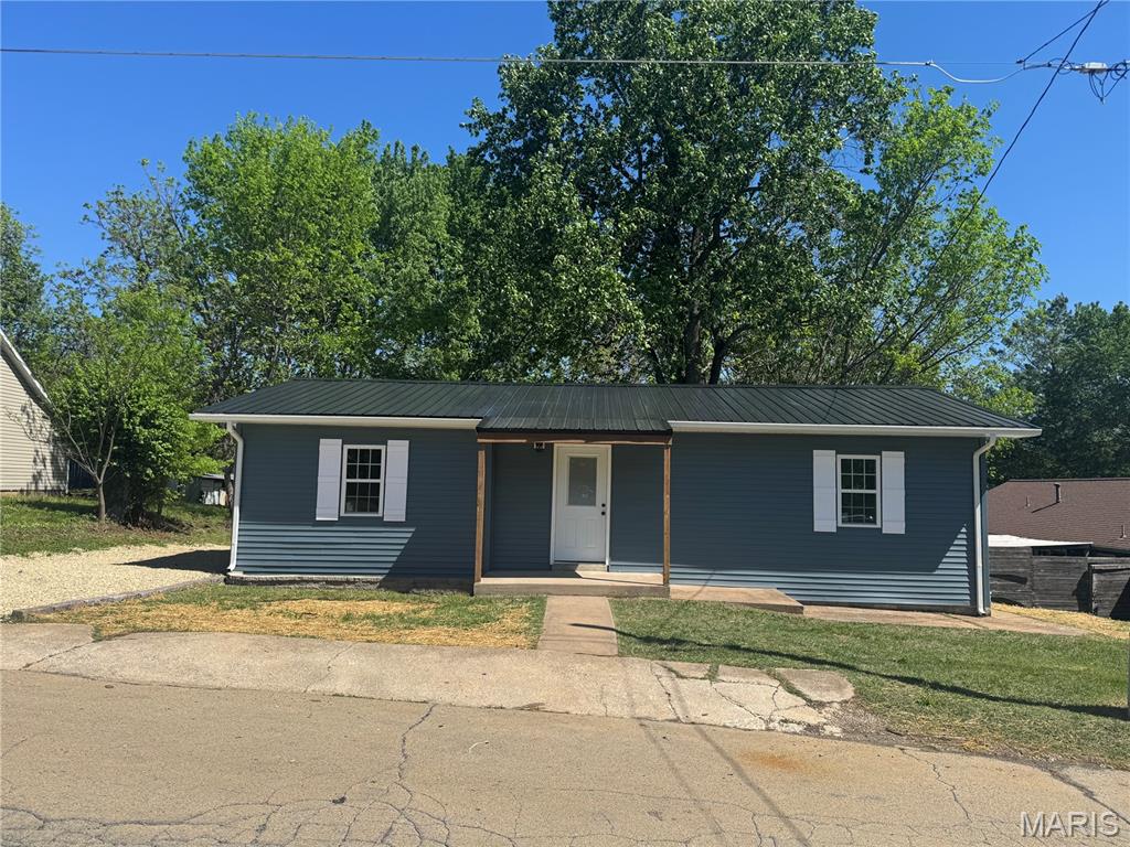 Cute completely remodeled 3 bedroom home that sits on a small basement for storage and storm shelter.... beautiful new covered deck off the kitchen with a gorgeous view of large back yard.... new siding, new roof, new windows new hvac, new kitchen, bath, new lighting....everything NEW!   Call today to schedule a tour!