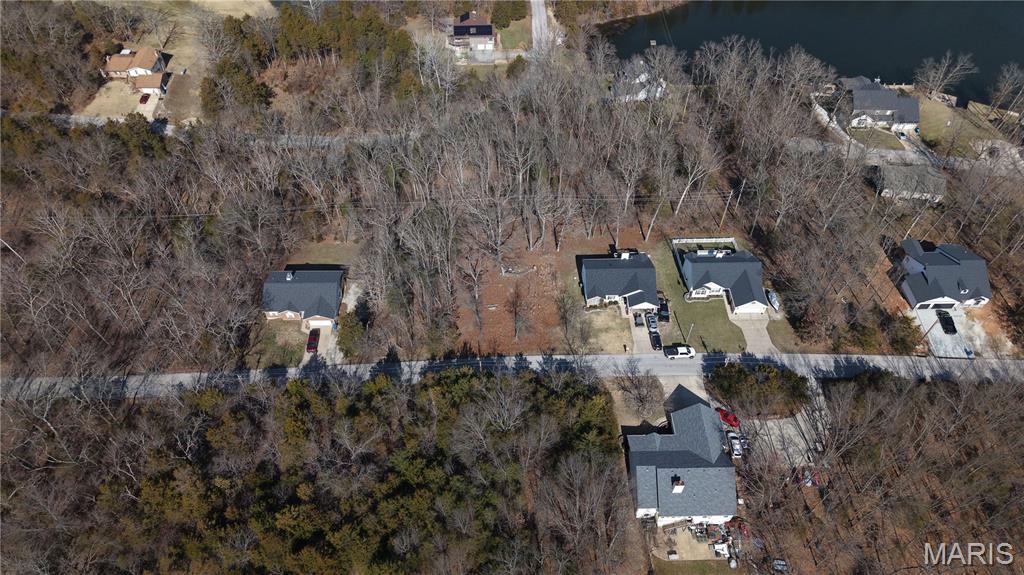 Builders Package: Right down from the BIG LAKE! Buy as an individual lot for lake access or check out the neighboring lots to purchase as a package and save, save, save! These ready-to-build home sites are located in this private, gated, resort-style community with 3 lakes, golf course, campgrounds and more. Perfect for builders to market to anyone seeking a peaceful, recreational lifestyle away from St. Louis, but still very close for easy family visits. Also perfect for get-away lake home. Enjoy the golf course, lake, boating, fishing, clubhouse, pool, etc. ! Just 20 minutes from South County! Builders Package:

This Includes:
5615 Katys Way (Cleared Lot) 
5621 Katys Way (Double Lot)
5623 Katys Way (Double Lot)
5629 Katys Way (Double Lot)
5631 Katys Way (Double Lot)

& More!