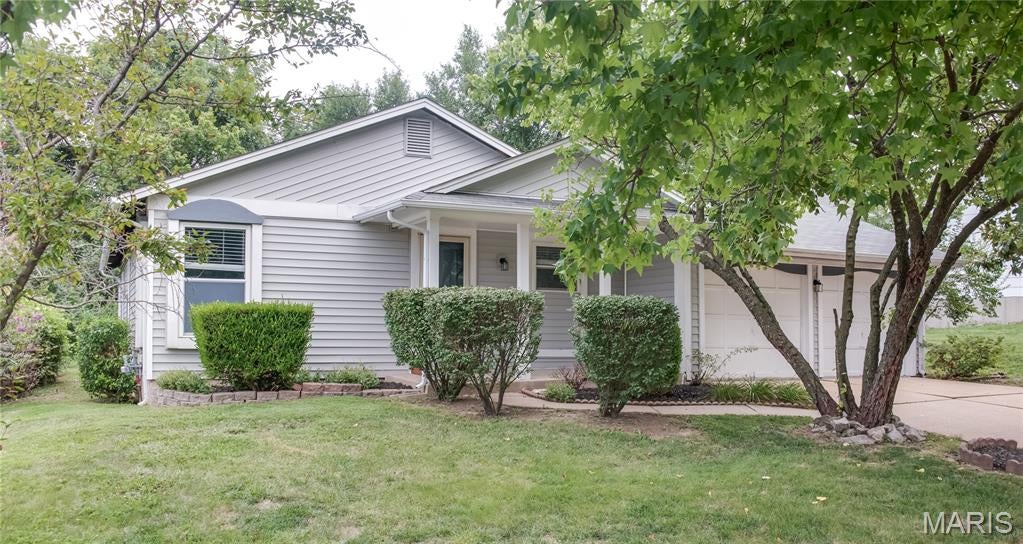 Recently updated 3-bedroom 2-bath ranch on a level lot with plenty of privacy. Updated kitchen with granite countertops, newer appliances, handsome cabinets refinished in 2023. New sliding glass door with integrated mini blinds (2024). All flooring has been replaced (2019) with high-quality LVP in neutral tones creating a wonderful canvas to decorate to your personal style. Replacement windows with window treatments included Primary the suite has its own bath with new toilet (2026) and new shower door (2026). New toilet fixture in hall bath (2026) Ceiling fans in all rooms. Dry basement has lots of light, a sump pump and drain tile ready to create more living space, epoxy injection (2019). Outside drain tile French drain professionally installed (2019).  Paver brick patio with privacy fence opens to a vast yard circled by natural privacy. Oversize 2 car garage with extra storage. Pleasant curb appeal. New roof (2018), New Water Heater (2018) Newer AC (2023). Close to transportation, easy access to Olive Blvd. Page extension I-270, shopping areas and airport.  Lots of amenities nearby and everything Westport Plaza has to offer.