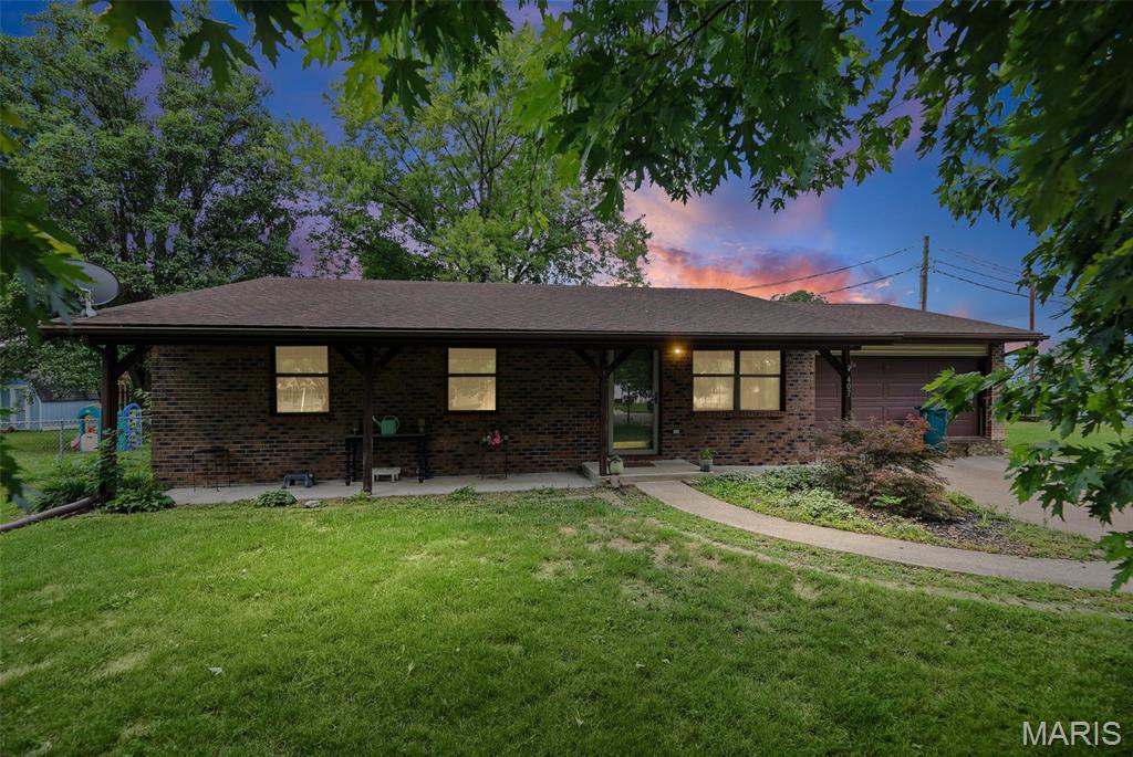 A timeless brick exterior and the ease of single-level living make this move-in-ready 3-bedroom, 1-bath ranch a wonderful place to call home. Situated on a corner lot in Smithton, this property offers an attached 2-car garage, a back patio, and convenient access to nearby restaurants, shopping, and everyday amenities. Inside, the large eat-in kitchen offers plenty of room for cooking, dining, and gathering. The main-floor laundry room is conveniently located just off the kitchen and includes ample storage space. All appliances stay, including the washer and dryer, giving the next owner an even easier transition. With its practical layout, classic curb appeal, and convenient location, this home is ready to be enjoyed from day one.