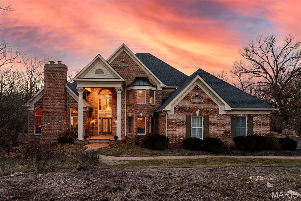 This Beautiful DeShetler Built Brick 1.5 Story 5 Bdrm 6 Bath Home, on a Incredible 1.26 Acre lot ,is located in the Desirable Kingspointe Neighborhood in Chesterfield! Over 7000 Sq Ft of REAL living space!!! The Grand 2-Story Entry, with Marble flooring and a winding staircase, welcomes you to this stunning home. The Primary Suite is located on the Main Level with access to the Handsome Vaulted Office/Library with floor to ceiling Brick Fireplace and Richly Paneled Walls & Wood Built-Ins. In addition, a Luxury updated Bath and Spacious Walk-In closets all overlooking the peacefulness of the Private Backyard! The Great Room with a 2 Story Fireplace, Granite Wet Bar, Beamed Ceilings, Windows galore and stunning outdoor views is the perfect gathering place for family and friends! The Large "Eat In" Kitchen adjoins a cozy Hearth Rm with a Fireplace & access to a Screened Porch! The home is Filled with Natural Light and the Views from every room are Amazing!!! The Walk-Out Lower Level, with a Full Bath, has TONS of Space for Extended Family, Play Area, Game Area, Sleeping area, etc....Lots of room for Storage too! Summer is extra fun with the 20 X 40 pool and outdoor decks for entertaining or to enjoy quiet time and relax! Amenities include Main Floor Laundry/Mud Room, 3 car oversized side entry Garage, Architectural  Millwork, Custom Windows, Irrigation System, Zoned HVAC, Roof 2024 and more! Close to schools, Parks, Shopping, Restaurants, etc. Easy Highway access! Kehrs Mill Elementary! This home is a gem!!!