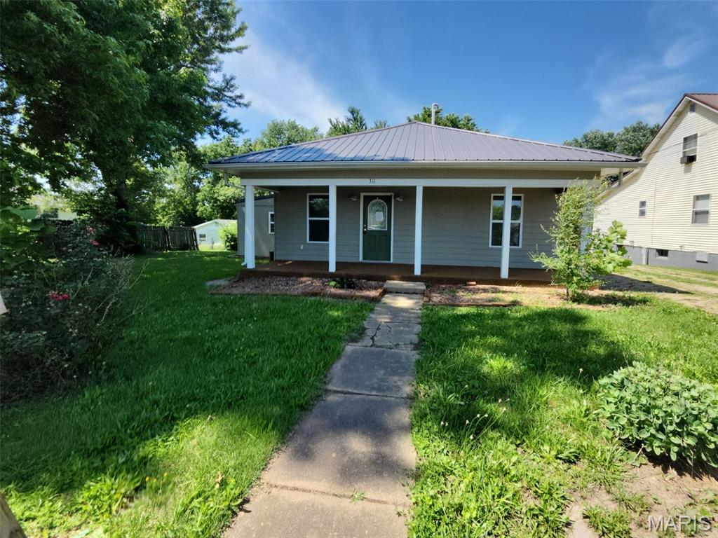 This inviting 3-bedroom, 2.5-bathroom home offers approximately 1,335 square feet of comfortable living space, perfectly situated on a completely level lot. The property features a welcoming front porch, a convenient 1-carport, and a practical crawl space foundation. Inside, the thoughtful layout provides plenty of room to relax and entertain. Located in the heart of Park Hills, this move-in-ready home is an excellent opportunity for anyone looking for a functional and beautiful place to live.