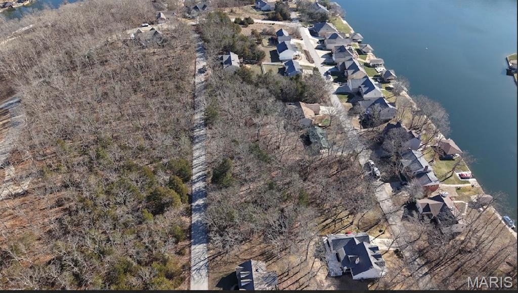 Builders Package: Double Lot Right down from Big Lake! Buy as an individual lot and survey/ combine two lots into one OVERSIZED LOT for lake access or check out the neighboring lots to purchase as a package and save, save, save! These ready-to-build home sites are located in this private, gated, resort-style community with 3 lakes, golf course, campgrounds and more. Perfect for builders to market to anyone seeking a peaceful, recreational lifestyle away from St. Louis, but still very close for easy family visits. Also perfect for get-away lake home. Enjoy the golf course, lake, boating, fishing, clubhouse, pool, etc. ! Just 20 minutes from South County! 

Builders Package:

This Includes: 
9668 Jackson 
9672 Jackson 

& More!