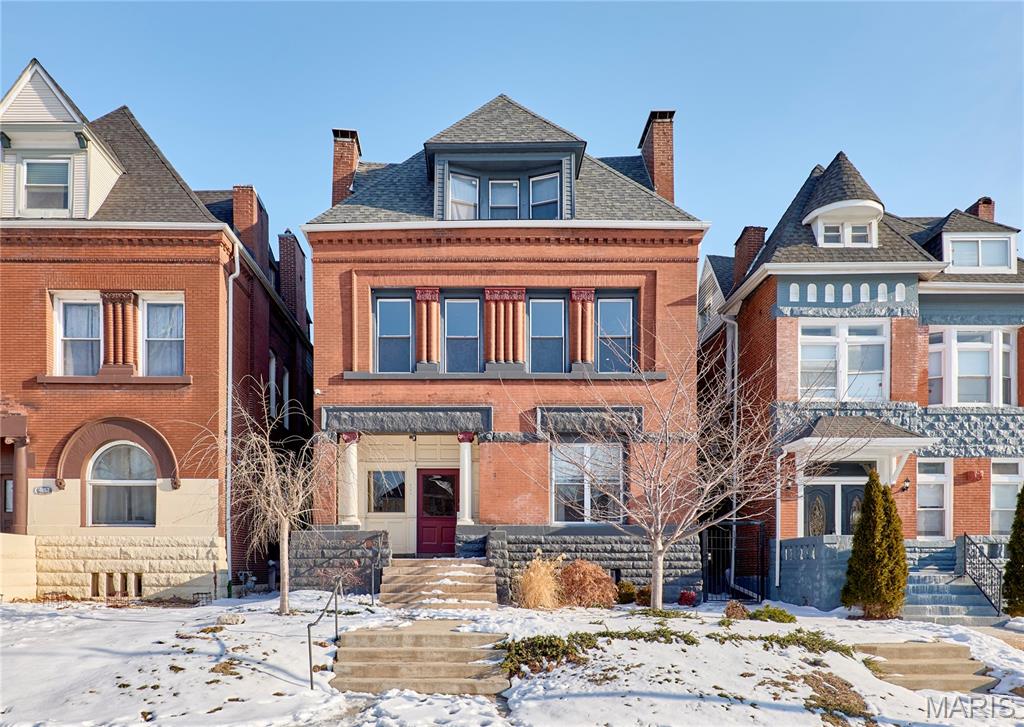 This beautifully reimagined 1,713 sq ft condominium seamlessly blends historic charm with contemporary luxury. Located in a distinguished brick building dating to 1891, this three-bedroom, two-bathroom residence offers an ideal setting for sophisticated urban living.
The open-concept layout is bathed in natural light, showcasing rich mahogany flooring and a thoughtfully curated neutral color scheme. Throughout the home, you'll find designer lighting, premium fixtures, two electric fireplaces, and integrated smart home technology.
The generous kitchen features cherry wood cabinetry, granite countertops, stainless Samsung appliances, and elegant marble tile flooring—perfect for both daily meals and entertaining.
The primary suite includes a spa-like ensuite bathroom, while two additional well-appointed bedrooms share a second full bath. Each bathroom boasts modern floating vanities, high-end fixtures, and designer tilework. Oversized windows throughout flood the space with light.
Practical amenities include an in-unit laundry closet with full-size washer and dryer, a spacious private deck for outdoor enjoyment, and one garage parking space