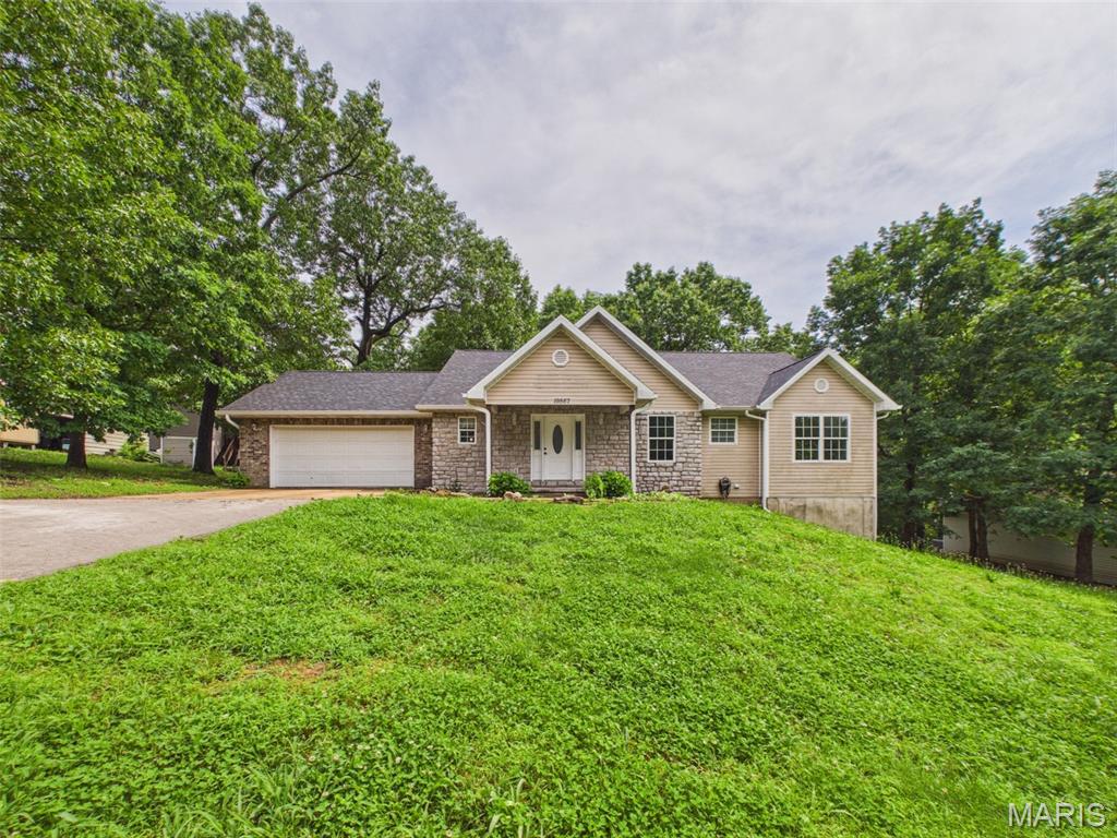 Experience the perfect blend of space, comfort, and refined country charm in this beautiful single-family home built in 2005. Featuring 6 spacious bedrooms, with 3 bedrooms on each level, this thoughtfully designed home offers flexibility for large families, multi-generational living, or guests. The inviting primary suite provides a private retreat complete with a luxurious jacuzzi tub, ideal for relaxing after a long day. Throughout the home, you'll find generous living spaces that combine functionality with comfort. Step outside and enjoy the covered back deck, a perfect setting for morning coffee, outdoor dining, or entertaining while taking in the surrounding views. Washer and dryer negotiable with acceptable offer. 

Schedule your private showing today and discover all this remarkable property has to offer.